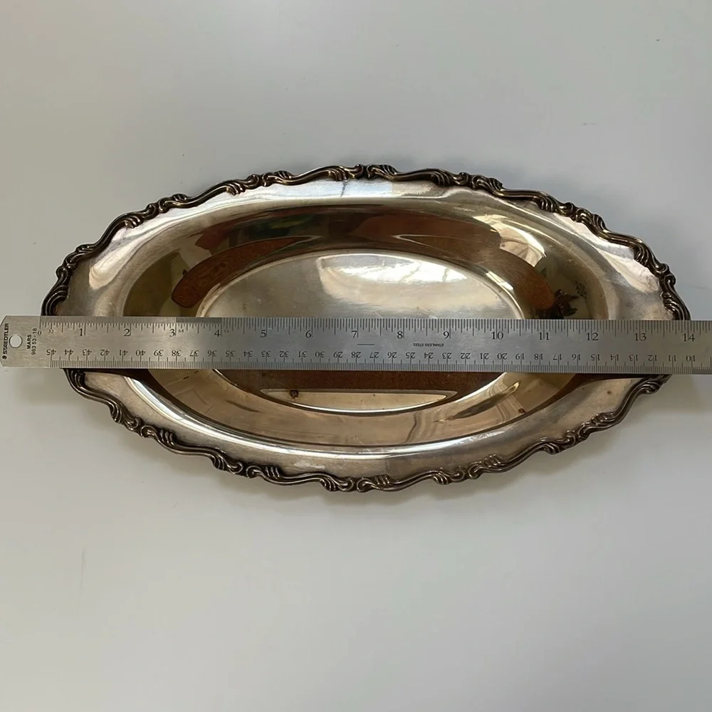 William A Rogers set of silver-plated gravy boat, butter‎ dish, & platter.